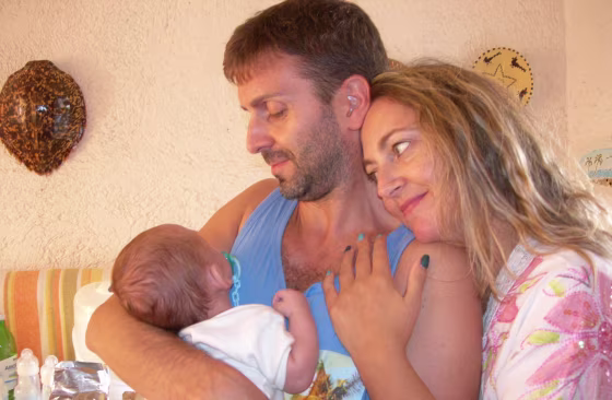 Image: Silvia Rosetti, Gianluca Ottavi, and their baby, Nathan