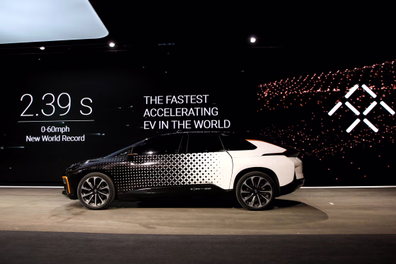 Image: A Faraday Future FF 91 electric car returns to the stage after an exhibition of speed during an unveiling event at CES in Las Vegas