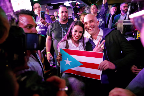 Image: Democratic congressional candidate Alexandria Ocasio-Cortez greets supporters at her midterm election night party in New York City