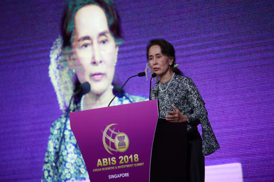Myanmar's State Counsellor Aung San Suu Kyi delivers her keynote speech at the ASEAN Business and Investment Summit in Singapore on Nov. 12, 2018.
