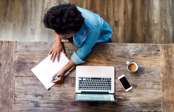 Image: Overhead view of a woman using a computer