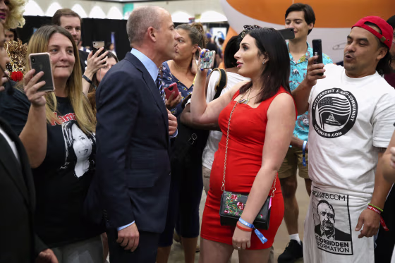 Image: Michael Avenatti and Laura Loomer attend Politicon 2018 at Los Angeles Convention Center