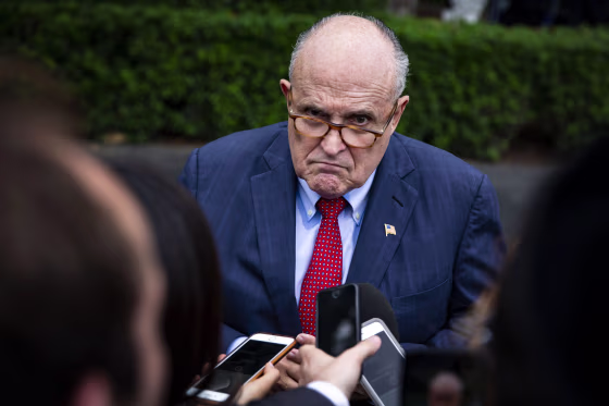 Rudy Giuliani speaks with reporters at the White House
