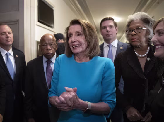 Image: Nancy Pelosi, John Lewis, Eric Swalwell