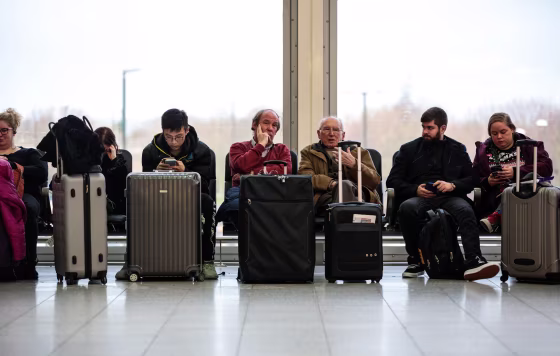 Image: Passengers wait in the South Terminal building at London's Gatwick Airport after flights resumed on Dec. 21, 2018.