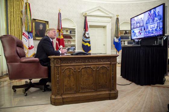 Image: President Donald Trump greets members of the military on video conference on Christmas Day in the Oval Office on Dec. 25, 2018.