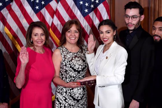 Image: Speaker of the House Nancy Pelosi performs a ceremonial swearing-in for U.S. House Representative Alexandria Ocasio-Cortez, D-NY