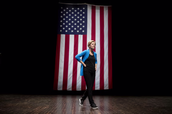 Image: Sen. Elizabeth Warren, D-Mass., takes the stage during a campaign event at Iowa State University in Ames on Oct. 21, 2019.