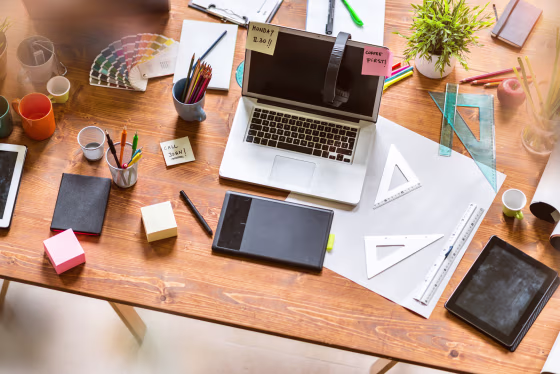 Image: Messy desk of young startup coworking business