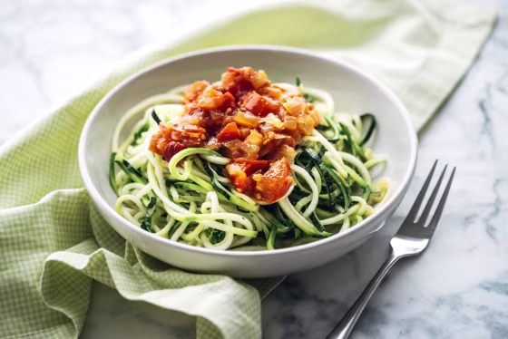 Image: Fresh zoodles with tomato sauce.