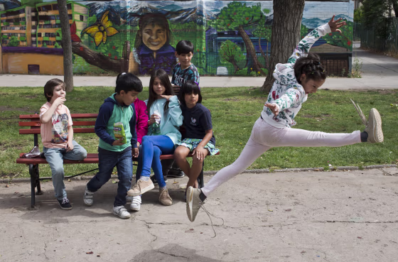 Image: Violeta jumps during recess at the Amaranta Gomez School in Santiago, Chile, on Dec. 11, 2018.