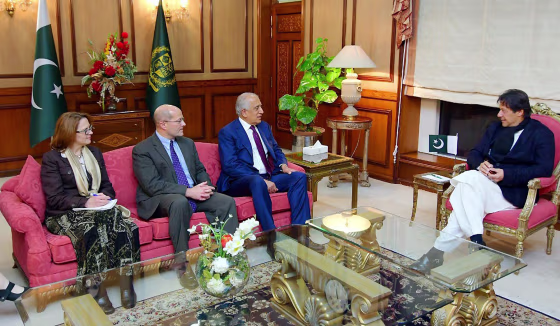 Image: Pakistani Prime Minister Imran Khan speaks with U.S. special envoy Zalmay Khalilzad during a meeting at the Prime Minister's office in Islamabad