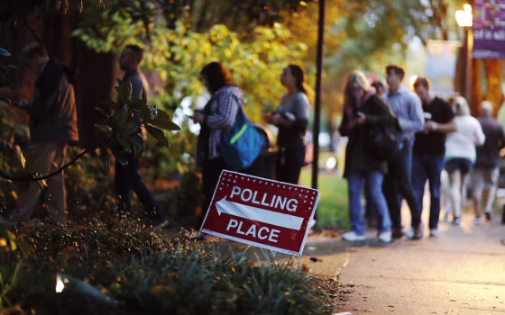 Image: A line forms outside a polling site on election day in Atlanta, Georgia, on Nov. 6, 2018.
