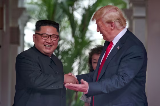 Image: U.S. President Donald Trump meets North Korean leader Kim Jong Un at the Capella Hotel on Sentosa island in Singapore
