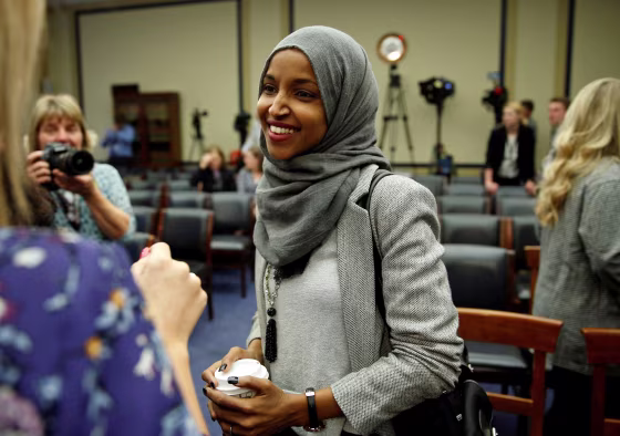 Image: FILE PHOTO: Representative-elect Ilhan Omar (D-MN) speaks to the media after a lottery for office assignments on Capitol Hill in Washington
