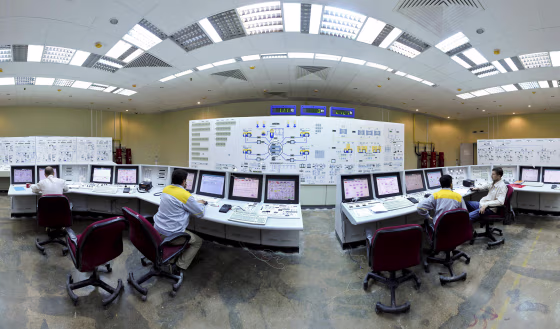 Iranian technicians, work with foreign colleagues at the Bushehr Nuclear Power Plant, just outside the southern port city of Bushehr, on Nov. 30, 2009.