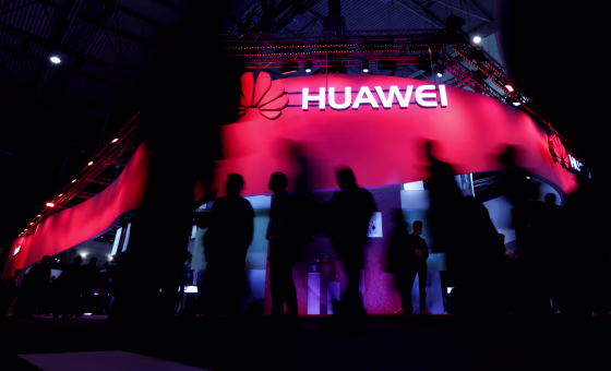 Image: Visitors walk past the Huawei booth at the Mobile World Congress in Barcelona on Feb. 27, 2017.