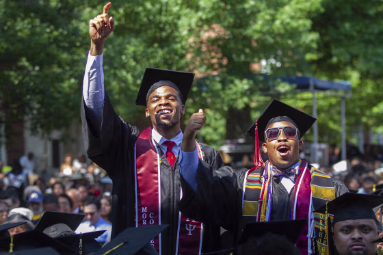 Image: Graduates react after hearing billionaire technology investor and philanthropist Robert F. Smith say he will provide grants to wipe out the student debt of the entire 2019 graduating class at Morehouse College in Atlanta