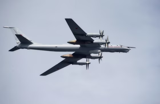 A Tu-95 strategic bomber flies over St. Petersburg, Russia, in 2017.