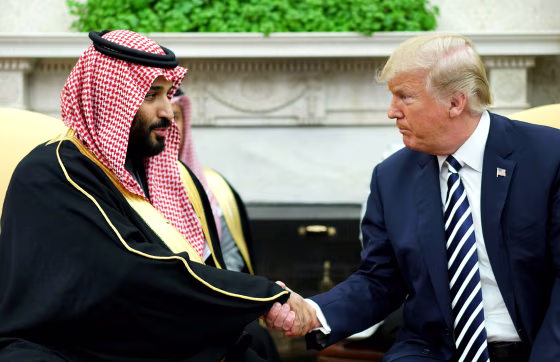 Image: President Donald Trump shakes hands with Saudi Arabia's Crown Prince Mohammed bin Salman in the Oval Office of the White House on March 20, 2018.