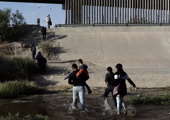 Image: Migrant families cross the Rio Grande at the border into El Paso, Texas, on May 31, 2019.