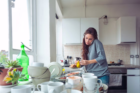 Woman washing dishes