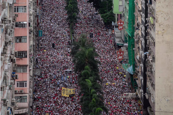 Image: Protesters march during a rally against a controversial extradition law proposal in Hong Kong