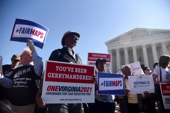 Image: Demonstrators gather outside the Supreme Court during oral arguments on a partisan gerrymandering case on Oct. 3, 2017.