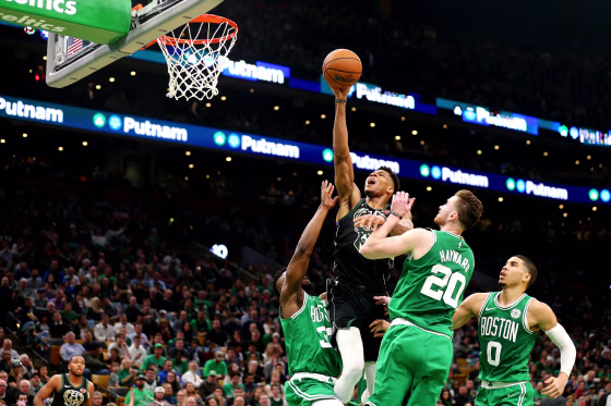 Image: Boston Celtics defenders try to block a shot from Giannis Antetokounmpo, of the Milwaukee Bucks, at TD Garden in Boston on Dec. 21, 2018.