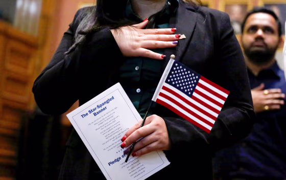 Image: A candidate for citizenship during a naturalization ceremony in Jersey City, New Jersey, on Feb. 22, 2017.