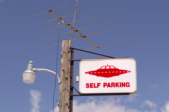 Image: UFO Parking Sign, gas station,