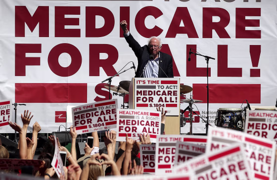 Image: Sanders speaks during a health care rally