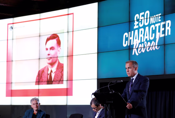 Image: Bank of England governor Mark Carney announces that mathematician Alan Turing will appear on the new 50 pound note in Manchester on July 15, 2019.