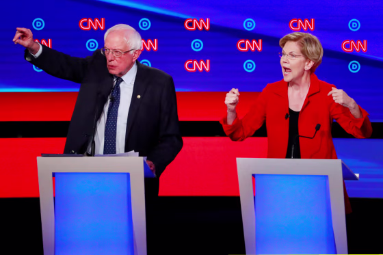 Image: Senators Sanders and Warren speak on the first night of the second 2020 Democratic U.S. presidential debate in Detroit, Michigan, U.S.