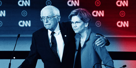 Image: Bernie Sanders and Elizabeth Warren hug at the end of the first round of the second Democratic primary debate in Detroit on July 30, 2019.