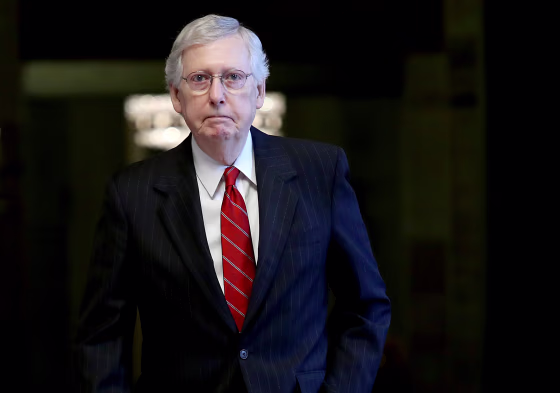 Image: Senate Majority Leader Mitch McConnell walks through the Capitol on Aug. 1, 2019.
