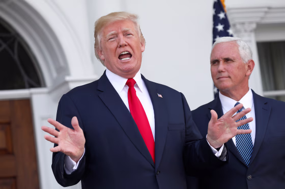 U.S. President Trump speaks to reporters with Vice President Mike Pence at his side in Bedminster, New Jersey