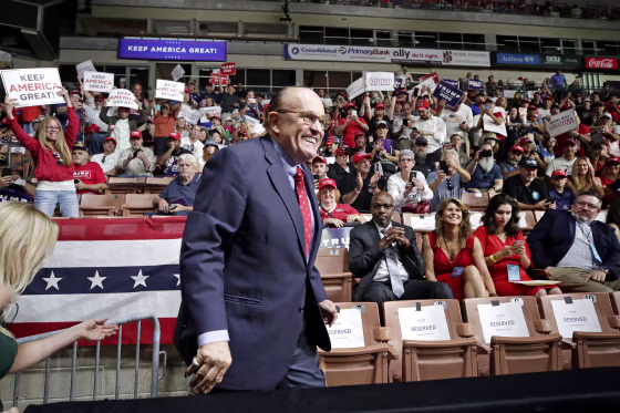 Image: Former New York City Mayor Rudy Giuliani smiles as he arrives to President Donald Trump's campaign rally on Aug. 15, 2019, in Manchester, N.H.