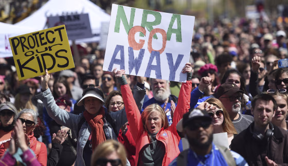 In this March 24, 2018, file photo, crowds of people participate in the March for Our Lives rally in support of gun control in San Francisco. The National Rifle Association sued San Francisco on Monday, Sept. 9, 2019, over the city's recent declaration that the gun-rights lobby is a "domestic terrorist organization."