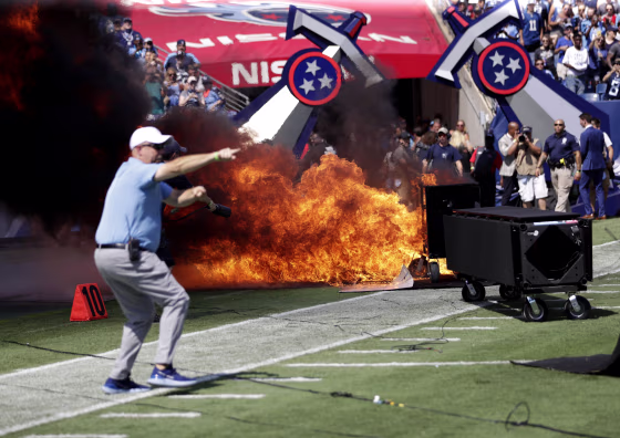 Image: A fire from a pyrotechnics machine burns on the field before a football game against the Tennessee Titans and Indianapolis Colts at Nissan Stadium on Tenn. on Sept. 15, 2019.