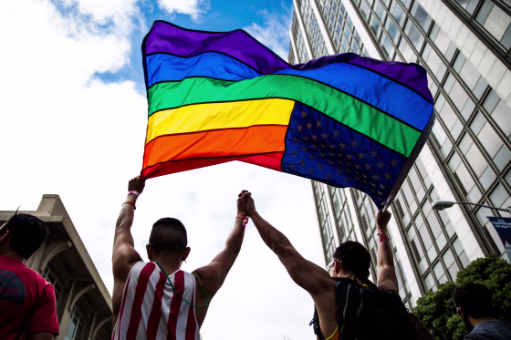Image: Paulo Torres, left, dances with his husband, Victor Tsang, after the San Francisco Gay Pride Parade in June 2015.