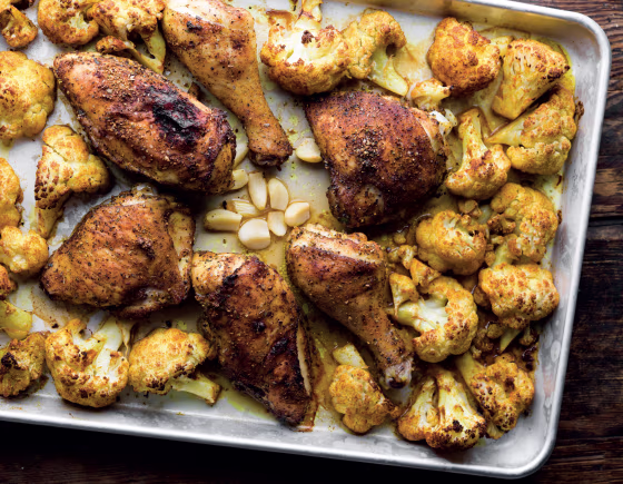 The roasted garlic and a few of the cauliflower florets are used to make a garlic yogurt sauce to finish the dish.