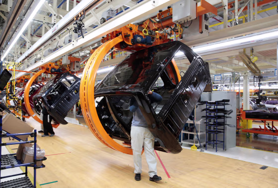 Fiat Chrysler Automobiles assembly workers build 2019 Ram pickup trucks on 'Rotating Carrier' assembly line at the FCA Sterling Heights Assembly Plant in Sterling Heights Michigan