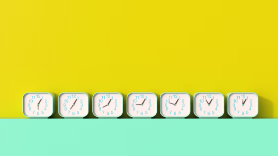 3D rendering, Row of alarm clocks, showing different times