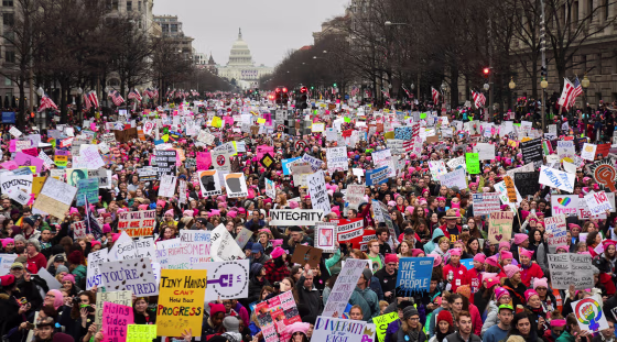 Image: Hundreds of thousands march down Pennsylvania Avenue during the Women's March in Washington