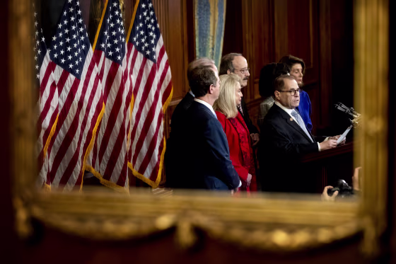 Image: House Judiciary Committee Chairman Jerrold Nadler, flanked by other ranking House Democrats, unveils the articles of impeachment against President Donald Trump on Capitol Hill on Dec. 10, 2019.