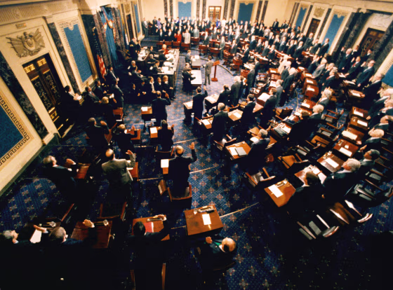 Image: Supreme Court Chief Justice William Rehnquist swears in senators to before the impeachment trial of President Bill Clinton on Jan. 7, 1999.