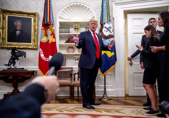 Image: President Donald Trump takes questions in the Oval Office on Sept. 30, 2019.