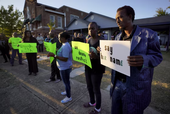 Image: Protesters gather outside the home where Atatiana Jefferson was fatally shot by police in Fort Worth, Texas, on Oct. 13, 2019.