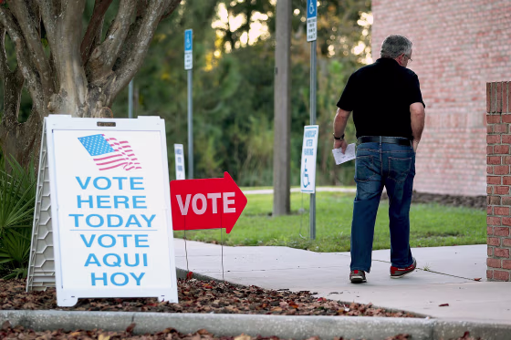 Voters Head To Polls As Early Voting Starts In Florida